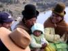 Bolivians asking for blessings Cerro Calvero, Cococabana Peru