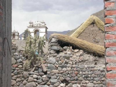 Yanque church behing typicalroofs